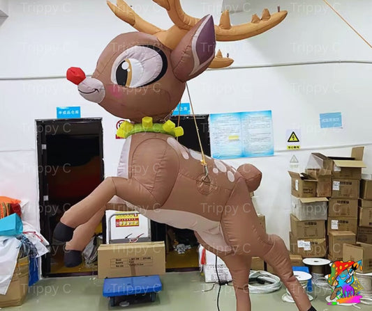 Flying inflatable Christmas reindeer suspended from ceiling