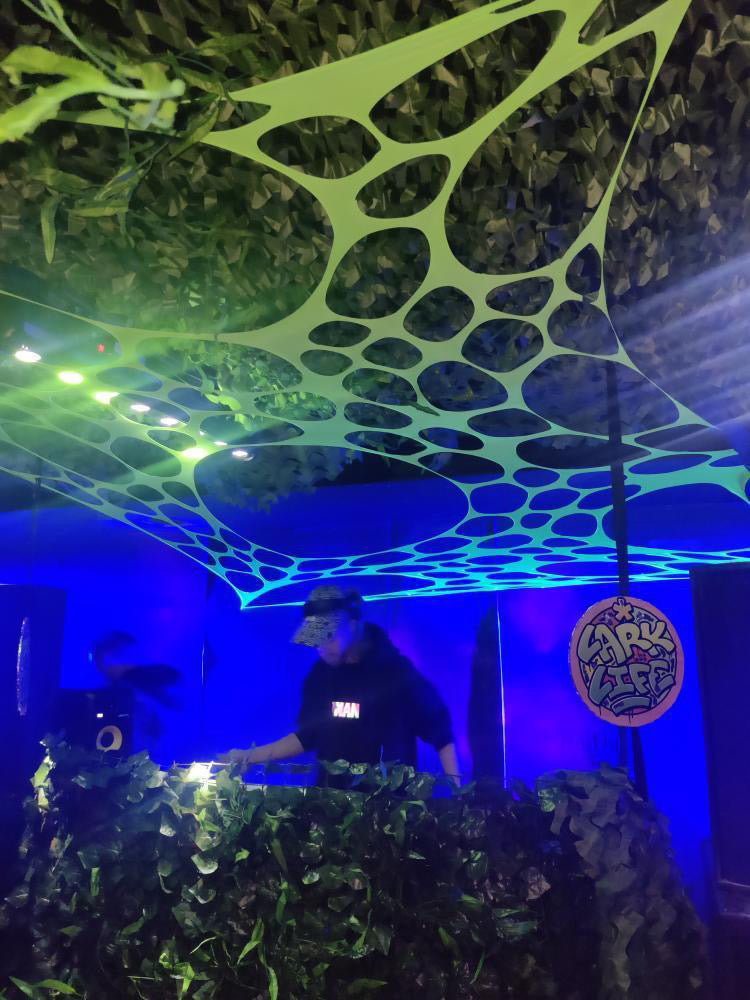 Hire UV green party props for raves, clubs, and festivals