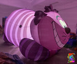 Purple smiling cat inflatable prop for whimsical wonderland installations