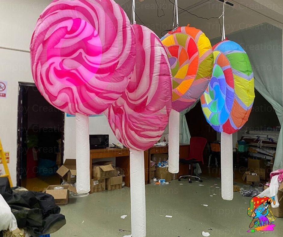 Large inflatable lollipops in a warehouse setting