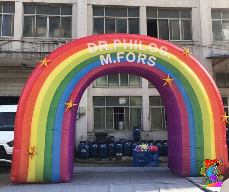 Giant inflatable rainbow decoration with custom text option