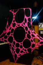 Psychedelic UV pink stage decorations for hire