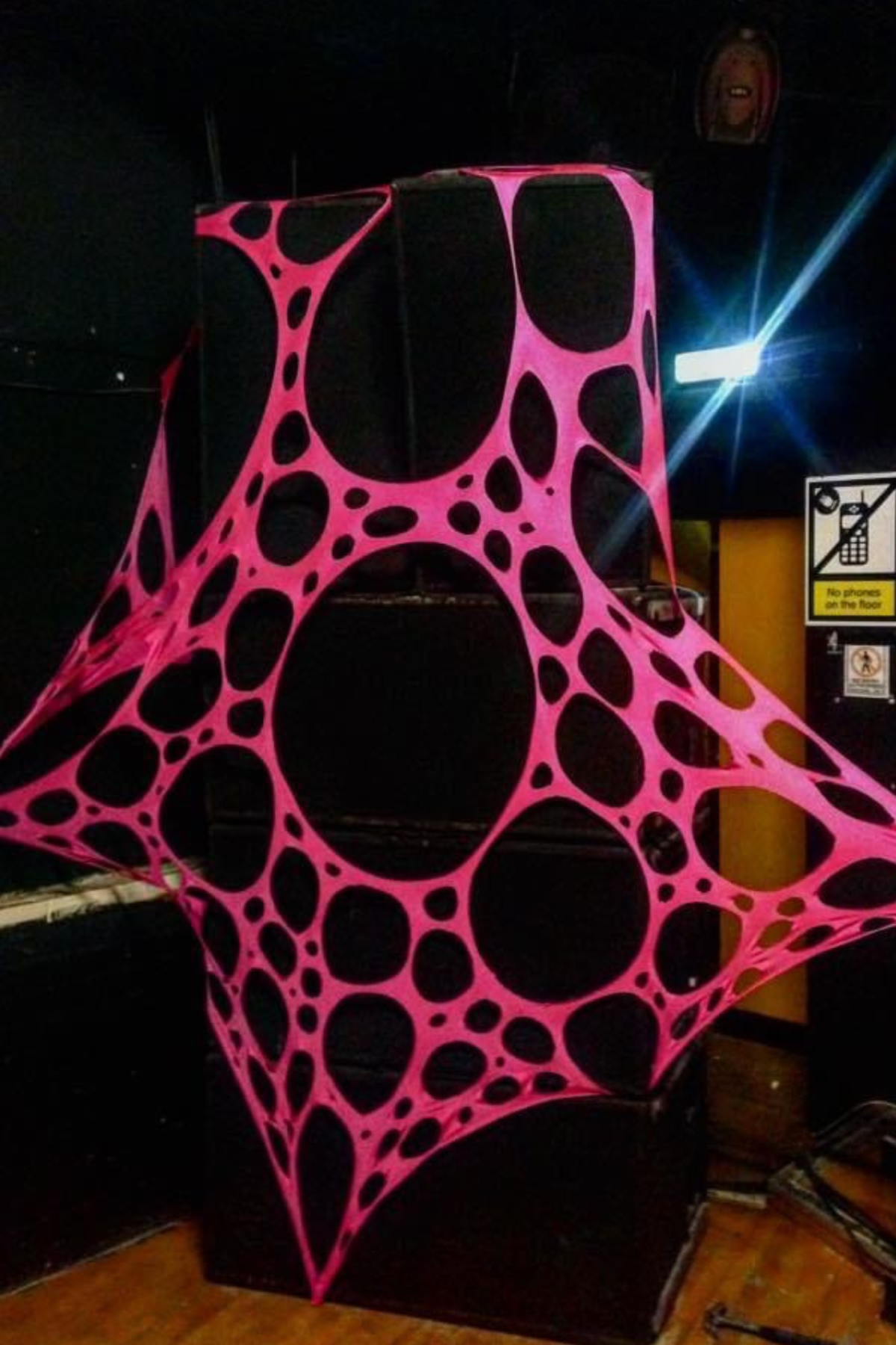 Psychedelic UV pink stage decorations for hire