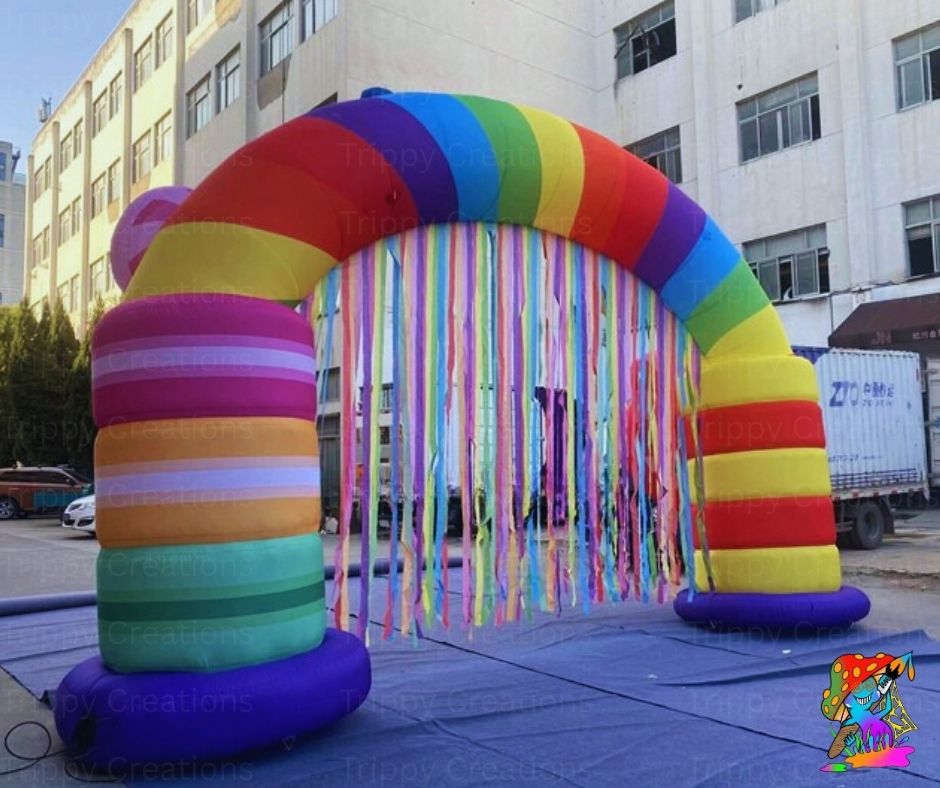Colorful inflatable archway with streamers in front of a building