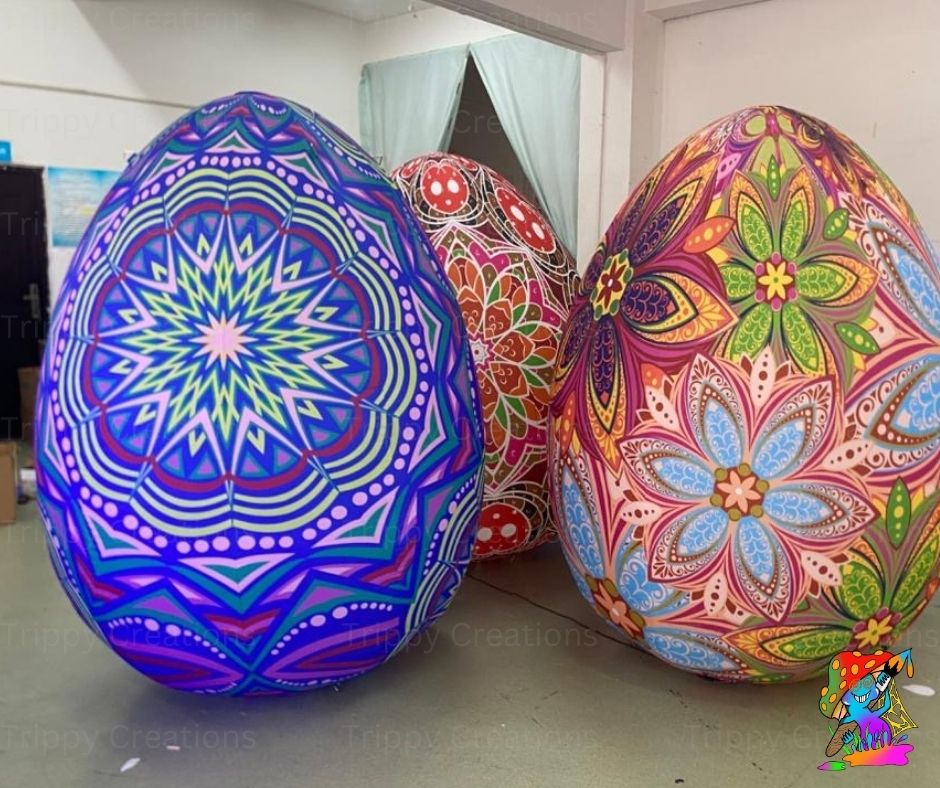 Colorful mandala-patterned eggs on a neutral background