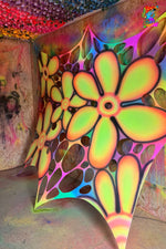 Neon UV daisy web festival decor for walls and immersive party spaces