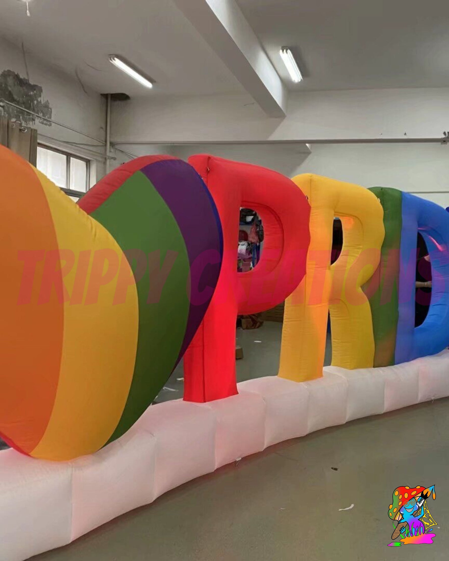 2m inflatable Pride prop featuring a rainbow love heart and white cloud effect base