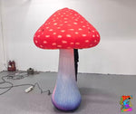 Inflatable mushroom lamp with red cap and purple base on a plain background