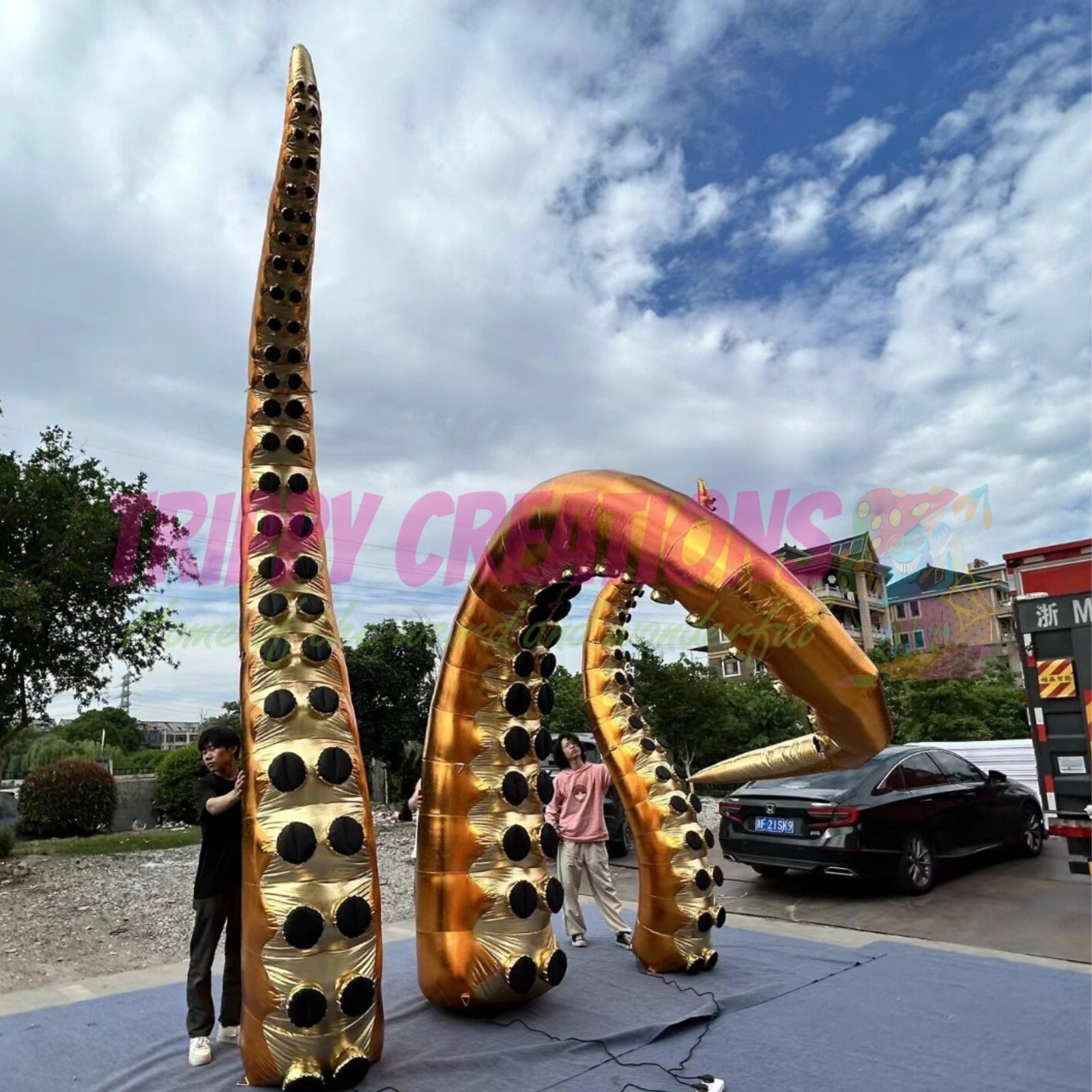 Giant inflatable golden tentacles for outdoor events and New Year celebrations