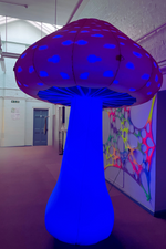 3m LED inflatable mushroom glowing with vibrant colors at an outdoor event
