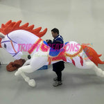 3 metre walking inflatable unicorn with flashing LED lighting for festivals and family events.