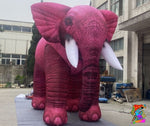 Oversized inflatable pink elephant for event photo backdrops