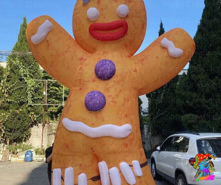 Inflatable gingerbread man decoration outdoors with trees and a car in the background