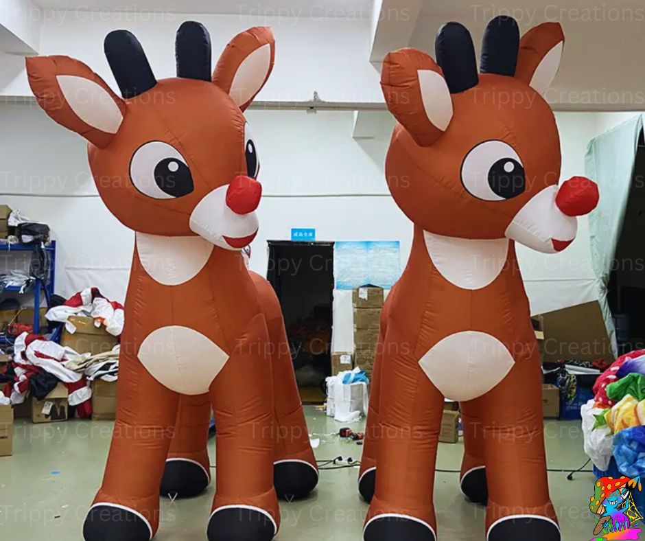 Two inflatable reindeer decorations with brown bodies, white hooves, black antlers, and red noses, displayed indoors.