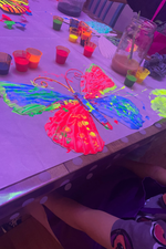 Hands-on UV painting experience at festivals
