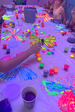 Immersive UV art workshop with blacklight effects

