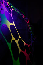 Psychedelic rainbow UV-reactive wall hanging for hire