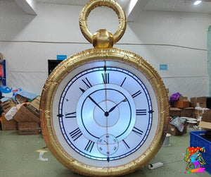 Gold pocket watch with a white face displaying Roman numerals in an indoor setting.