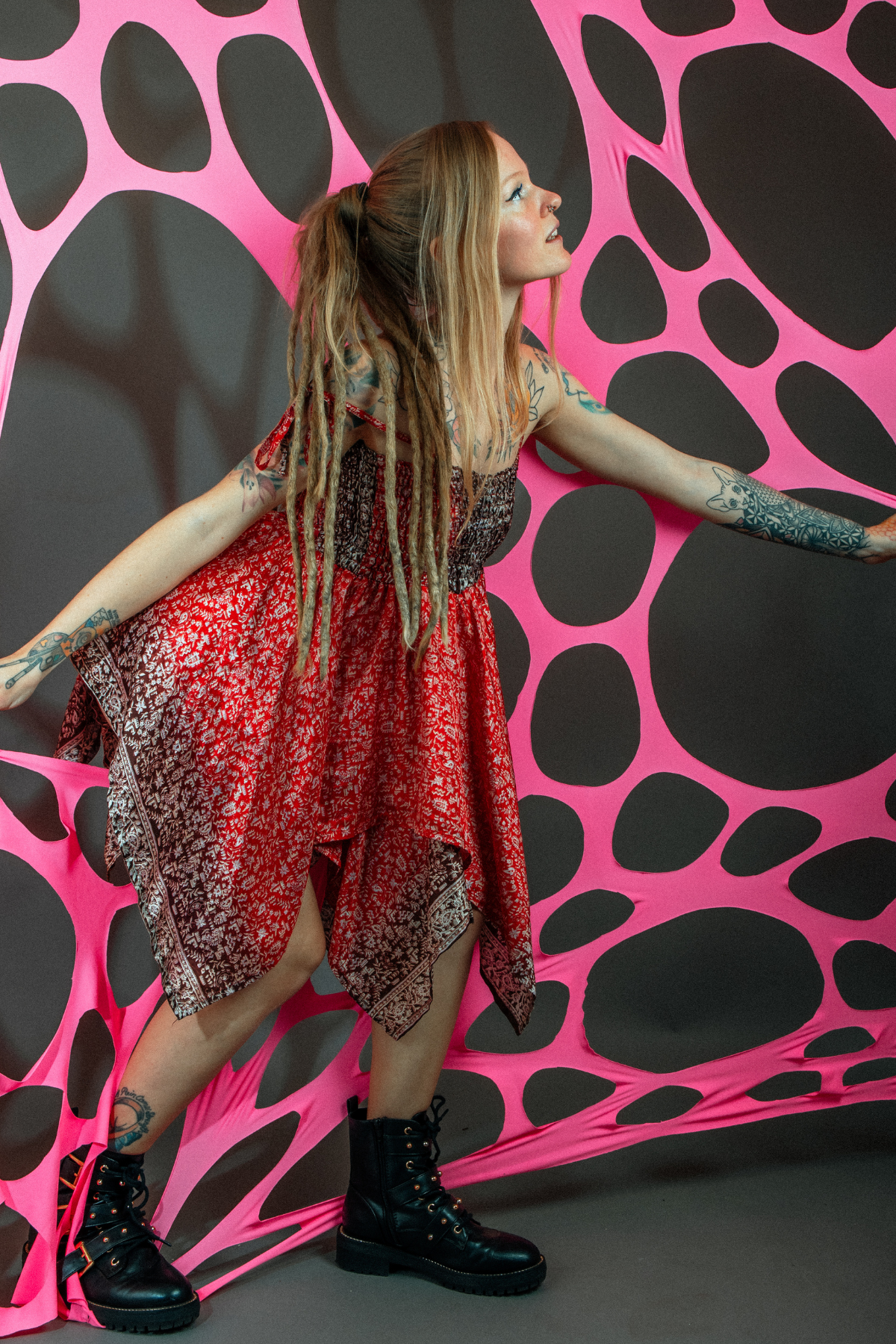 Bright UV-reactive pink decorations for psychedelic event hire