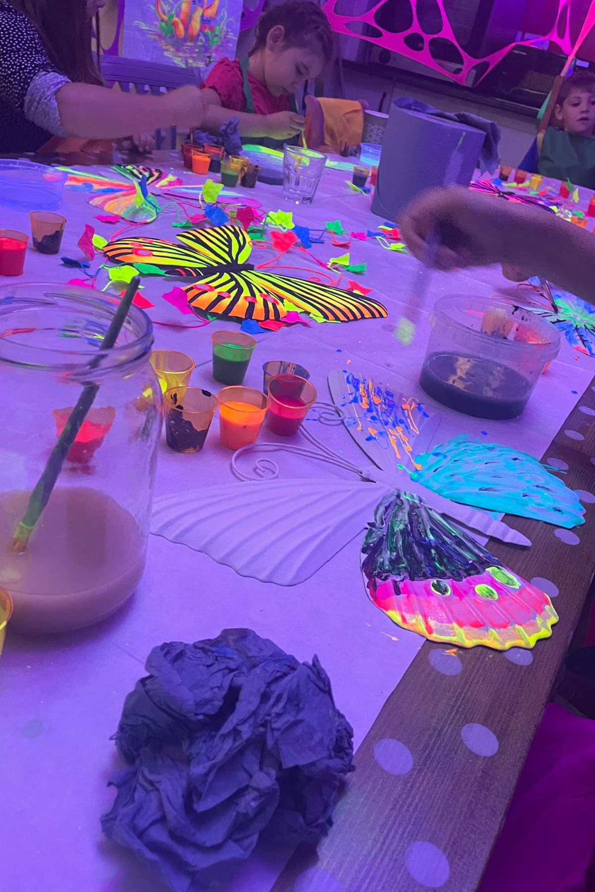 Glow-in-the-dark painting at a UV workshop
