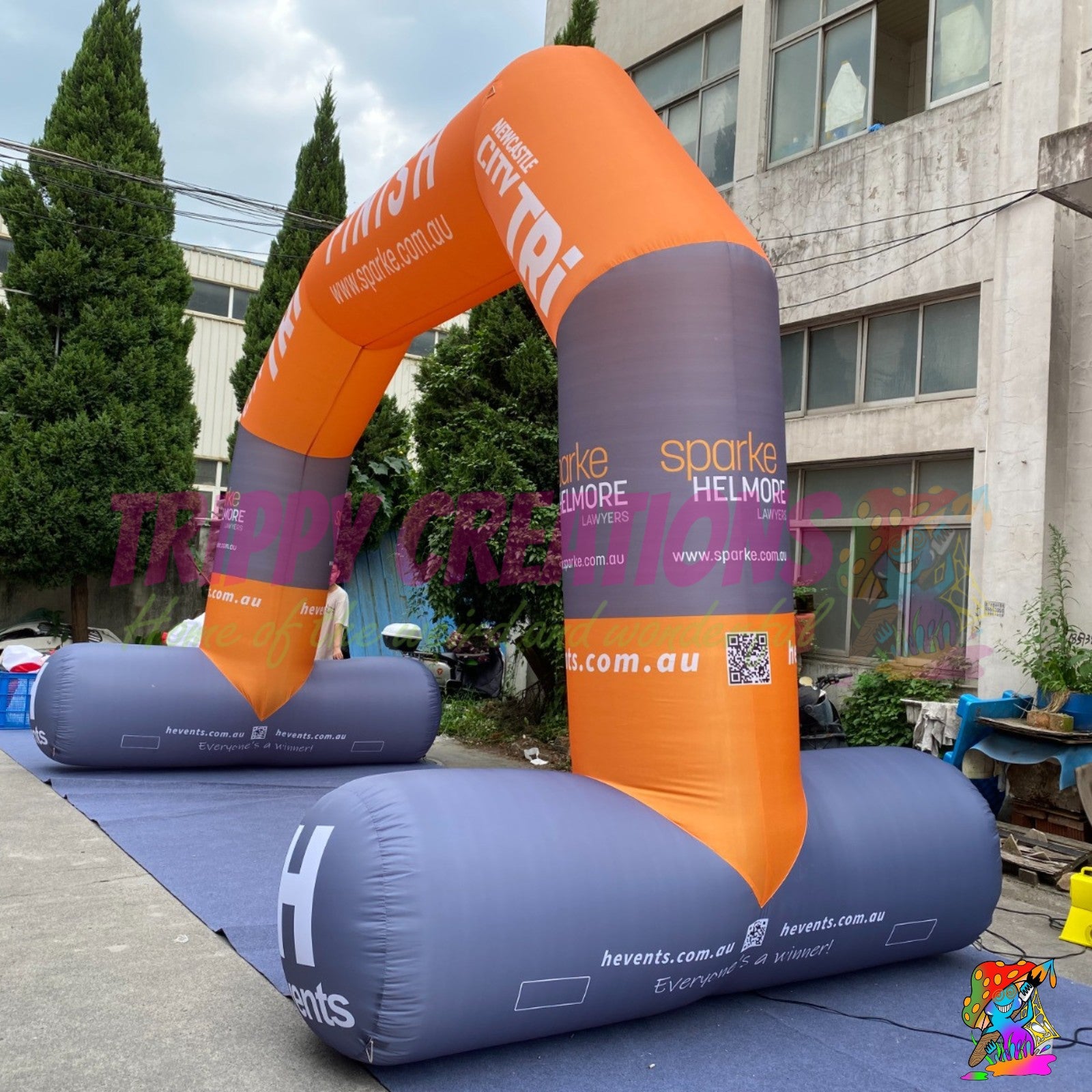 Fully customised inflatable arch featuring business branding and logos