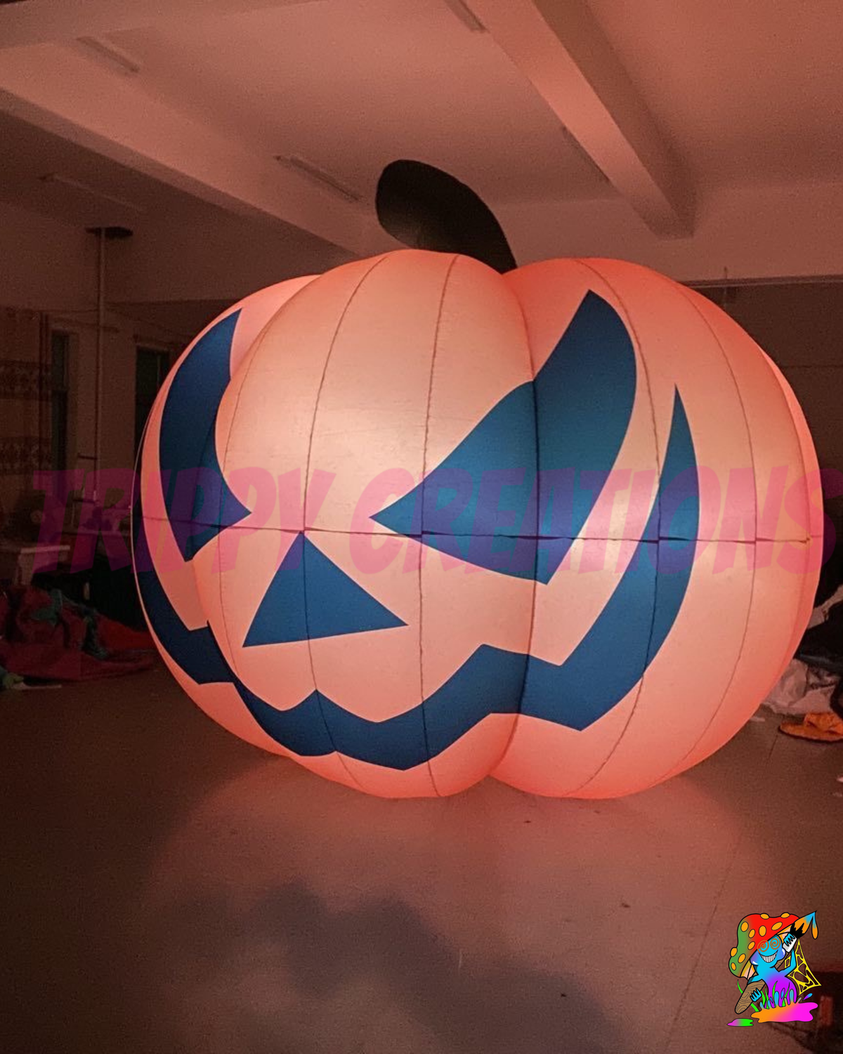 Large inflatable pumpkin prop for spooky event entrances and autumn displays