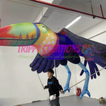 Eye-catching tropical parrot walking act costume creating a vibrant festival atmosphere