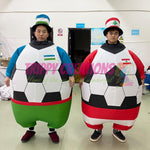 Giant inflatable football costume creating guest engagement at a sports event.