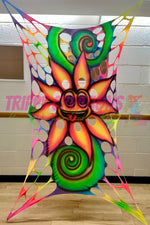 Cheeky tongue-out flower wall hanging for UV parties, raves, and neon events