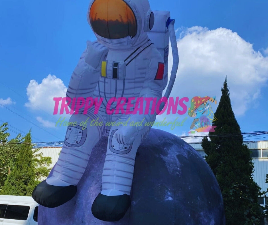 giant astronaut on moon inflatable for science parties