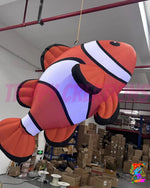 Giant 2 metre inflatable clownfish prop inspired by tropical reef fish for immersive underwater themed event décor