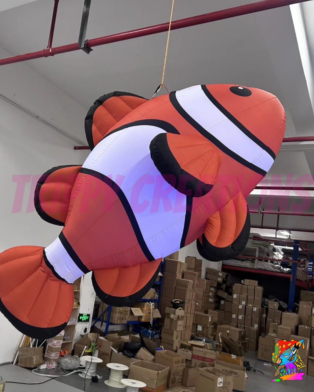 Giant 2 metre inflatable clownfish prop inspired by tropical reef fish for immersive underwater themed event décor