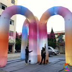 Commercial Giant LED Rainbow Inflatable Arch creating a colourful illuminated entrance for corporate events, festivals and brand activations.