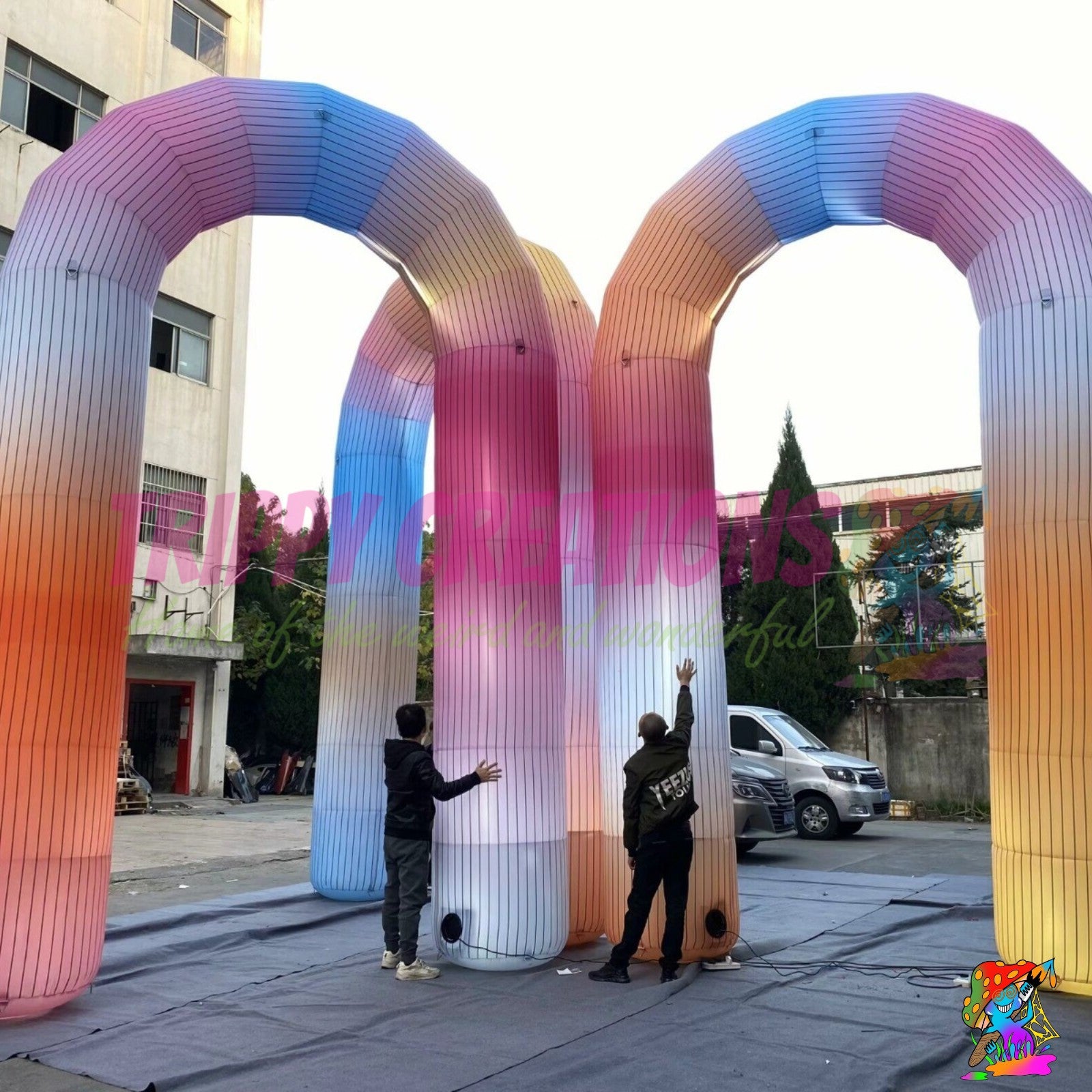 Commercial Giant LED Rainbow Inflatable Arch creating a colourful illuminated entrance for corporate events, festivals and brand activations.