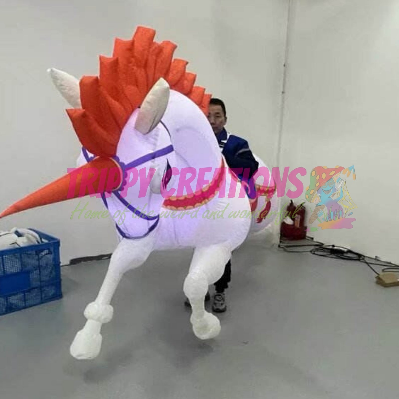 Giant illuminated unicorn costume designed for event organisers and entertainment companies.