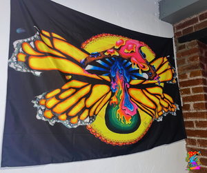 UV-reactive mushroom and butterfly wall art for parties.
