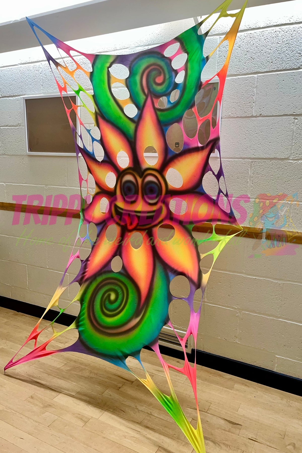 Unique hand-painted neon flower UV wall hanging for psychedelic festival and party decor