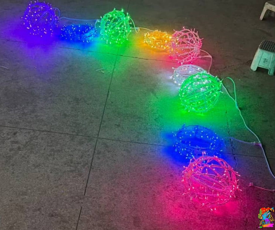 Hanging LED orb lights suspended at varied lengths for event lighting