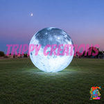 Trippy Creations giant inflatable moon prop with LED lighting for festivals, event venues, stage sets and space themed party decor.