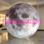 Giant inflatable moon with realistic lunar print and event grade construction for festivals, space themed parties and immersive venue displays.