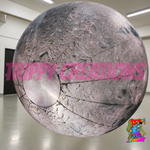 Giant LED moon inflatable event prop by Trippy Creations for space themed events, stage production, festivals and venue decor.