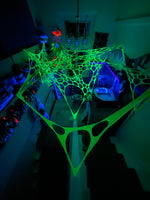 Neon UV tapestry decorations for psychedelic event styling