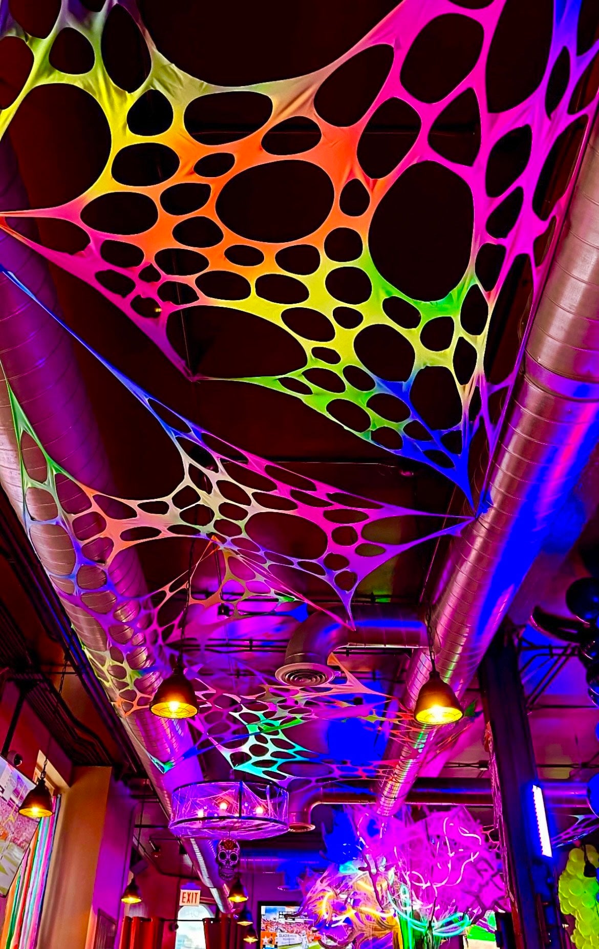 Large trippy UV tapestry hire for immersive festival experiences