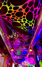Psychedelic UV rainbow wall hangings for hire for dancefloors