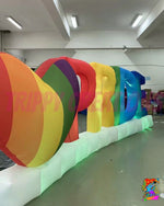 Large Pride inflatable with rainbow love heart design for festivals and themed events