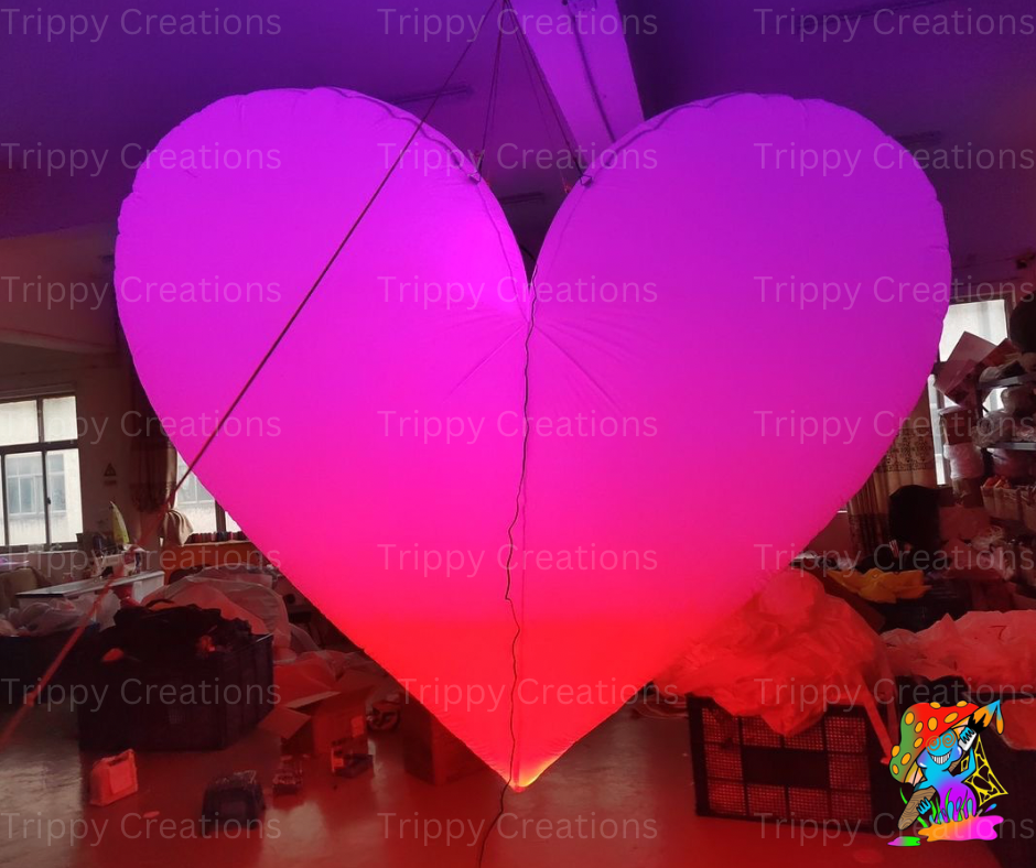 Glowing LED inflatable love heart, perfect for romantic events
