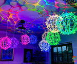 LED orb lights arranged for large-scale immersive installation lighting