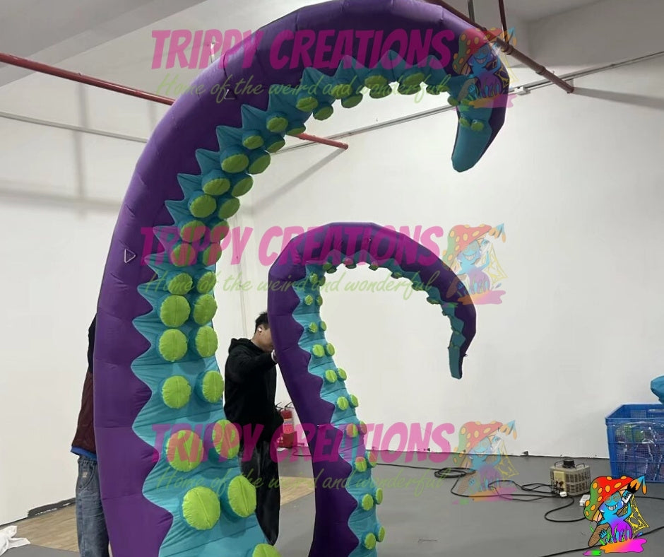 large purple blue tentacle props for immersive festival installations