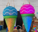 Candy-themed inflatable ice cream cone prop for events