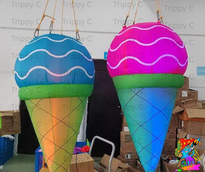 Candy-themed inflatable ice cream cone prop for events